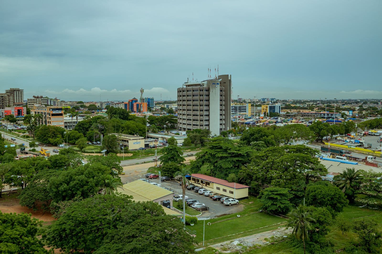 Aerial view of Tema in Greater Accra, Ghana — cityscape with a logistics and container yard.
